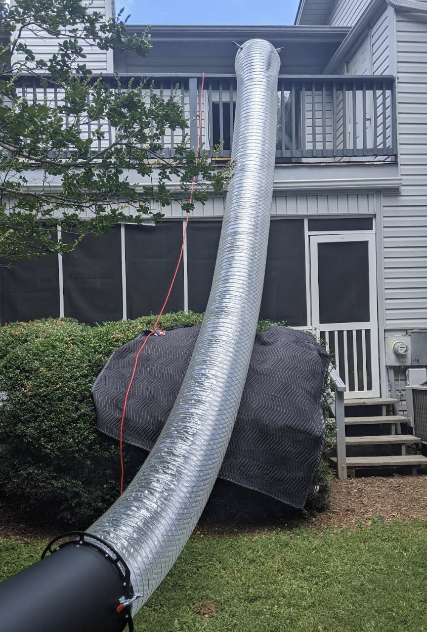 Heat treatment hose routed to an upper level as part of a longer multi-room treatment setup