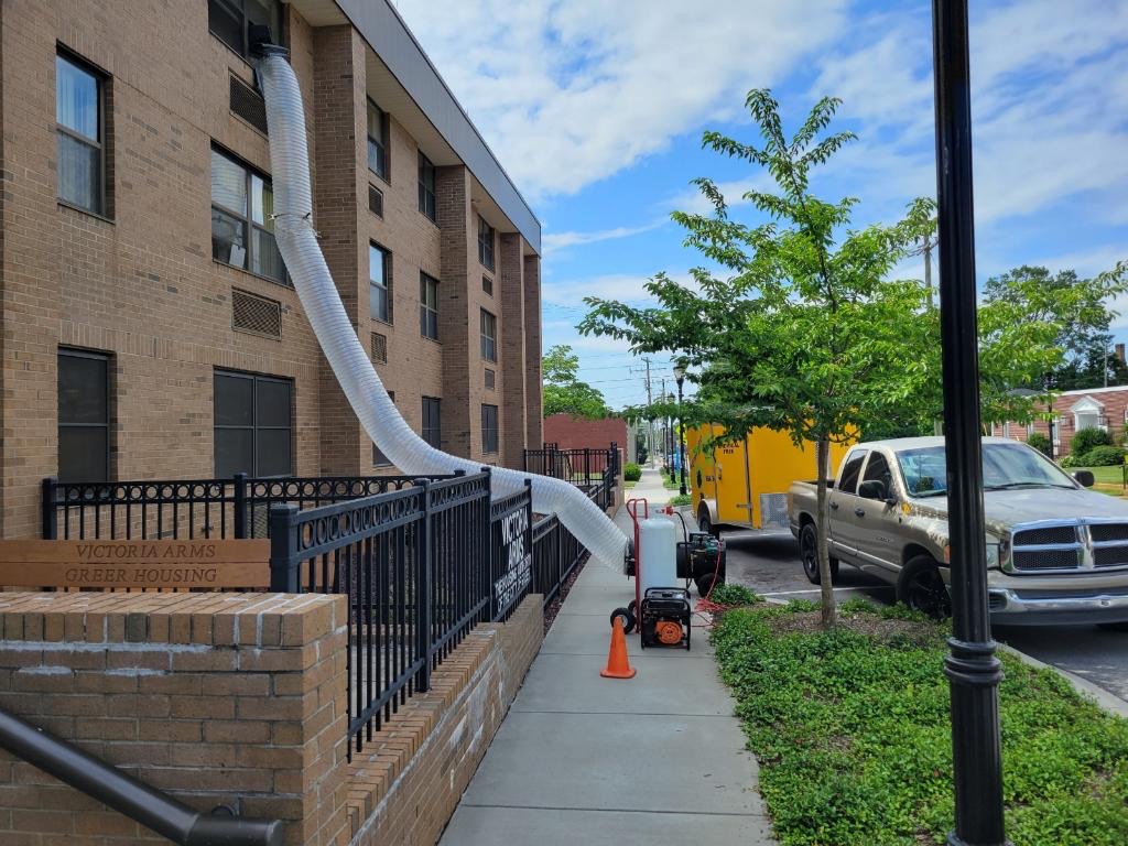 Commercial bed bug heat treatment equipment beside a housing or managed property in Greer South Carolina