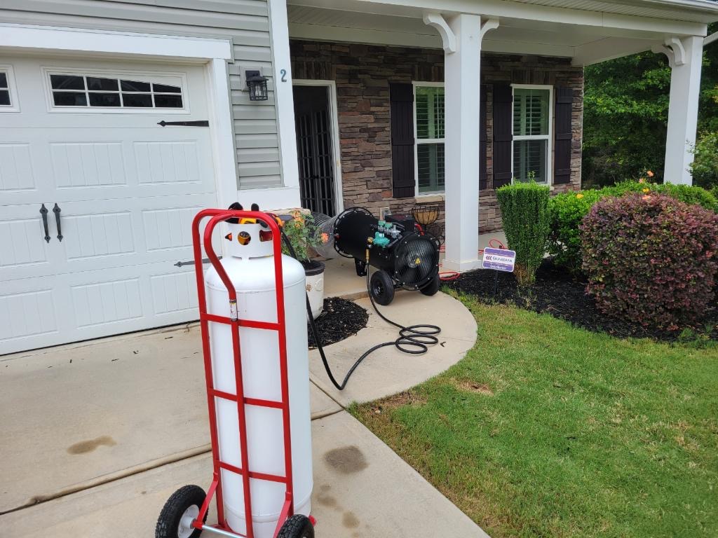 Real Enviro Heat treatment equipment staged outside a customer home in South Carolina